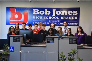 student workers at the credit union branch at Bob Jones High School 